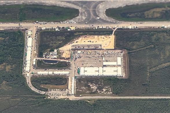 An aerial view of a migrant detention center, dubbed "Alligator Alcatraz," is seen located at the site of the Dade-Collier Training and Transition Airport