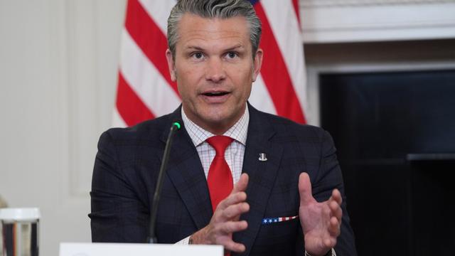Defense Secretary Pete Hegseth answers a question from a reporter during a roundtable on criminal cartels in the State Dining Room of the White House, Thursday, Oct. 23, 2025, in Washington. (AP Photo/Evan Vucci)